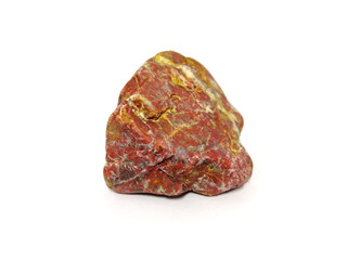 Jasper stone and quartz veins  on white background. red stone, Jasper stone is an aggregate mineral commonly used in New Age practices and in feng shui.