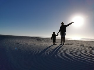 Fototapeta premium Mother & Son on beach