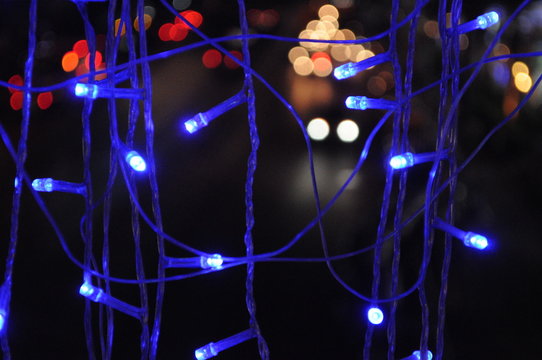 Close-up Of Blue Illuminated String Lights At Night