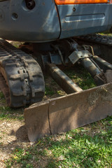 details of crawler excavator such as the controls the cloches the bucket the hydraulic pumps the tracks