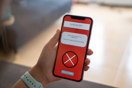 Close Up Of A Smartphone Showing A Coronavirus App Developed By The Government That Tells You The COVID 19 Test Results And Give A Message Of 