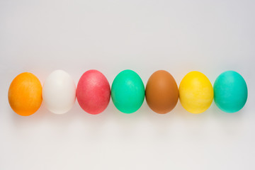 Colored easter eggs on white background