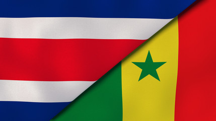 The flags of Costa Rica and Senegal. News, reportage, business background. 3d illustration