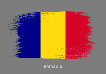 Romania republic official flag in shape of paintbrush stroke. Romanian national identity symbol. Grunge brush blot isolated on grey background vector illustration. Romania country patriotic stamp.