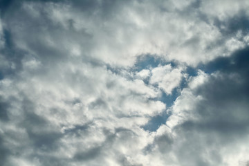 Only pure sky with natural clouds without contrails