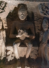 Sculptures of Gautama Buddha inside the Caves of Ajanta, an UNESCO world heritage site near...