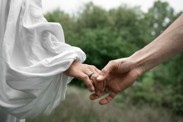 hands of lovers man and woman