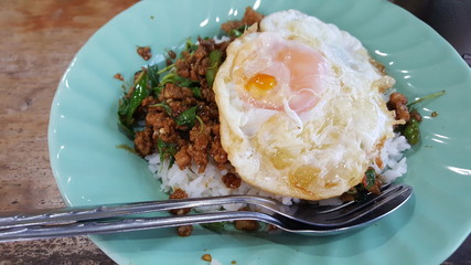 Stir fried basil with minced pork and rice With a fried egg on top