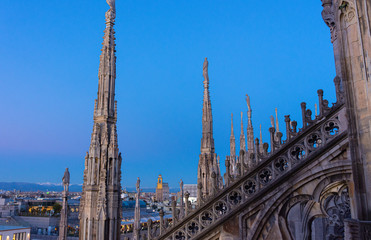 Fototapeta na wymiar Italy, Milan, 13 February 2020, view from the Duomo terrace, details of the spiers