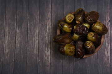 Ramadan concept. Dates close-up in the foreground.