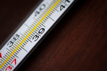 
close-up thermometer lying on the table