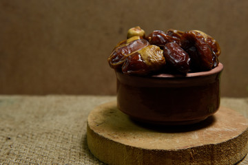 Ramadan concept. Dates close-up in the foreground.