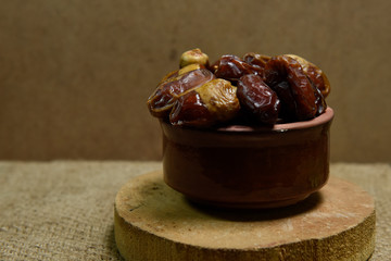Ramadan concept. Dates close-up in the foreground.
