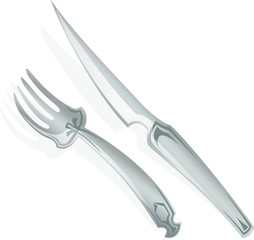 Cuchillo y tenedor de plata para comer lujosamente