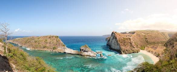 Popular photo spot and tourist destination Atuh Beach and cliff, in Nusa Penida Island, Bali, Indonesia