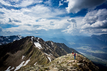 Wanderer hiking on the Rietzer Grie&szlig;kogel over the Inntal
