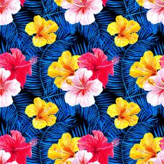 Red, white, yellow hibiscus flowers with blue palm leaves on a black background. Watercolor tropical seamless pattern. Design for textile, fabric, wallpaper, packaging.