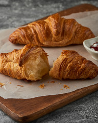 fresh croissant on a wooden table