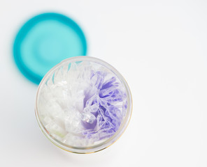 selective focus of plastic straws in jar ,top view on blur background