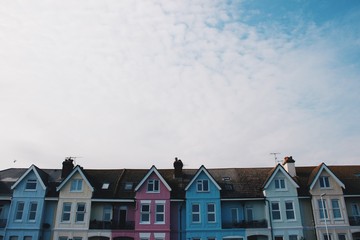 colorful houses on the background of blue sky