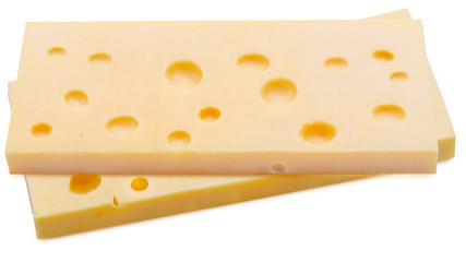Two portions (blocks) of Emmental Swiss cheese. Texture of holes and alveoli. Isolated on white background