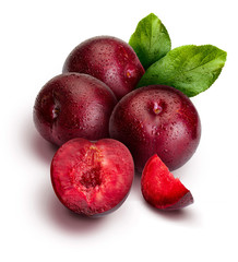 Appetizing and healthy red plums, whole and cut into segments with an aspect of illustration. Includes leaves of the plum tree. Isolated on white background.