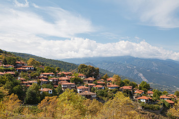 Fototapeta premium The old city Palaios Panteleiomonas, tourist attraction in Greece. Leptokaria travel destination in east Macedonia. Aerial view.