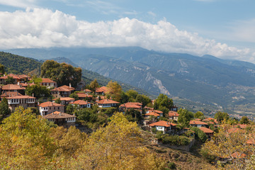 Fototapeta premium The old city Palaios Panteleiomonas, tourist attraction in Greece. Leptokaria travel destination in east Macedonia. Aerial view.