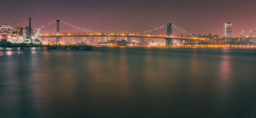 Fototapeta na wymiar suspension bridge NYC night lights