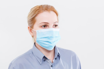 Businesswoman with protecting mask on her lips