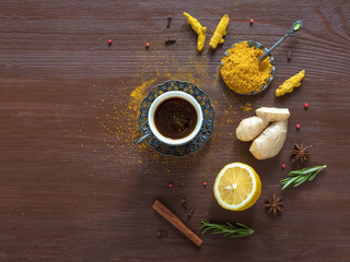 Black coffee with turmeric, cinnamon,ginger, lemon and pepper