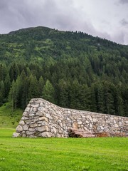 Avalanche protection wall in Galtuer, Paznaun valley, Tyrol, Austria. These giant walls were constructed in order to protect the village houses after the avalanche disaster of 1999.