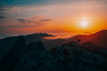 Sunset in the mountains in the fog