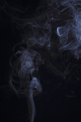 Fototapeta premium Abstract white smoke texture on black background