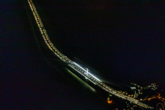 Fototapeta A aerial view of the Bay Bridge over the San Francisco Bay.