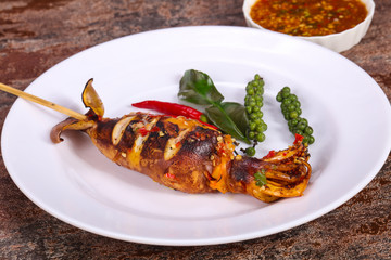 Grilled squid with sauce and hebs