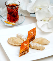 shekerbura pakhlava and mutaki with hot black tea