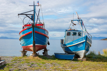 Punta Arenas, Chile, Fishing boats on the shore.
 Fishing has long been the main occupation of Patagonia.