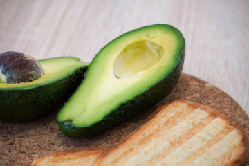avocado on wooden table