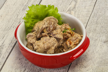 Chicken liver with cream and dry tomatoes