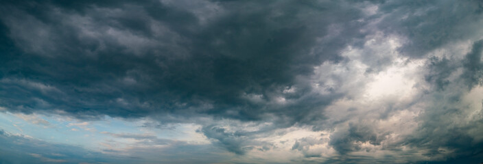 Panorama of storm clouds on sky over city