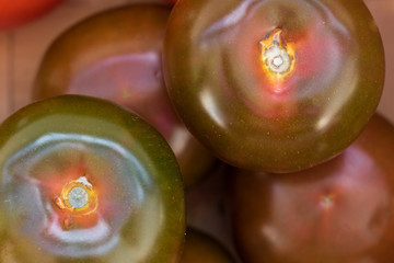Colorful tomatoes. Closeup of vegetables. Background, texture.