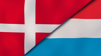 The flags of Denmark and Luxembourg. News, reportage, business background. 3d illustration