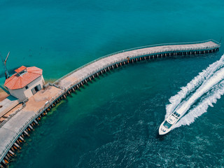 Empty Pier, Lone Boat