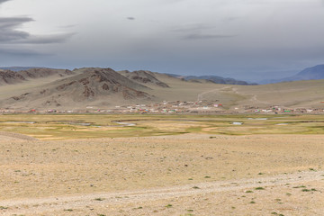 Fototapeta na wymiar A small settlement in the Altai mountains of Mongolia