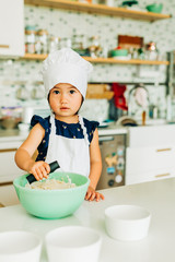 Toddler Girl Baking Cookies