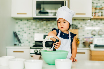 Toddler Girl Baking Cookies