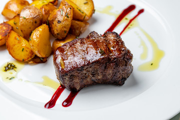 grilled steak filet Mignon with baked mini potatoes
