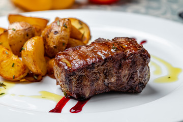 grilled steak filet Mignon with baked mini potatoes