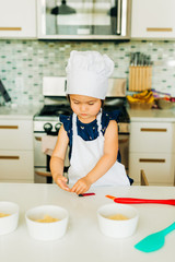 Toddler Girl Baking Cookies